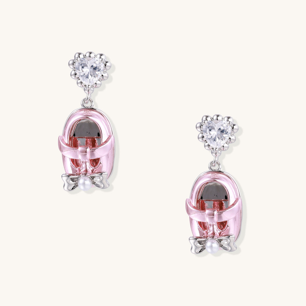 18K gold plated drop earrings with heart-shaped zirconia studs and translucent mini handbag pendants with pearl accents
